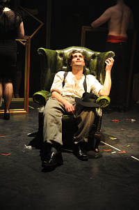 Peer in chair looking towards 'heaven'